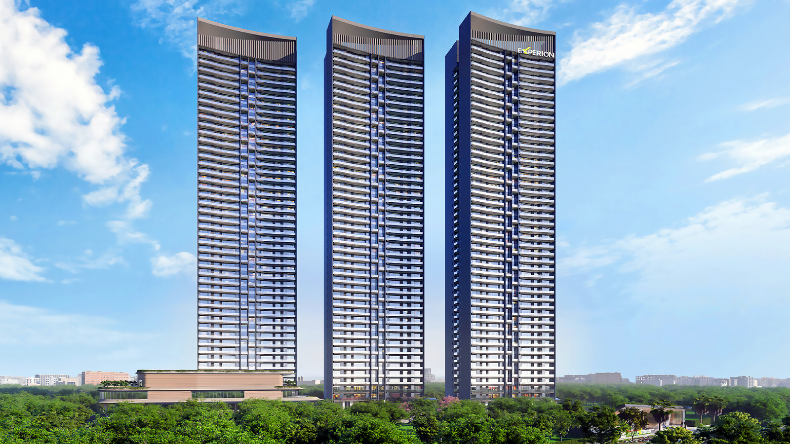 Tall modern buildings with blue sky and green trees in front