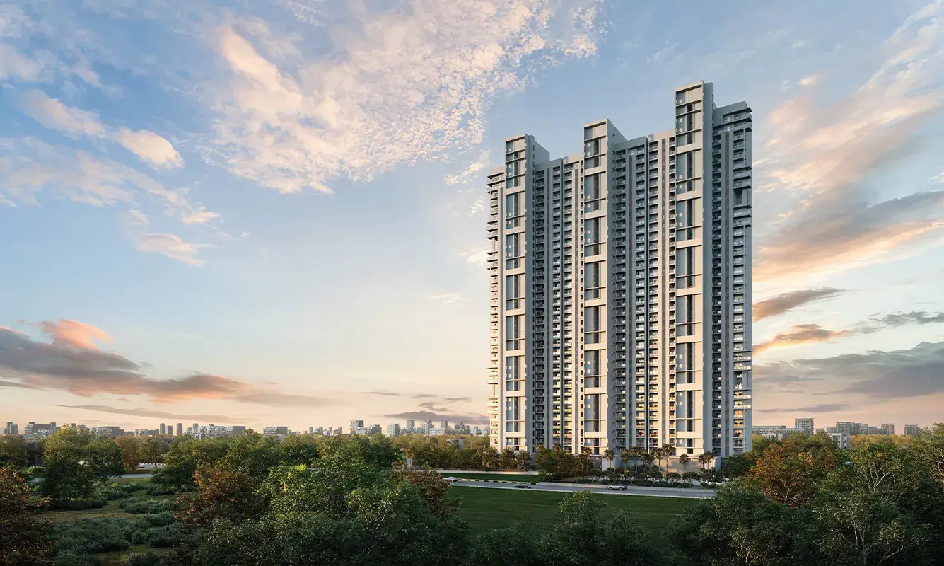 Tall modern buildings with blue sky and green trees in front